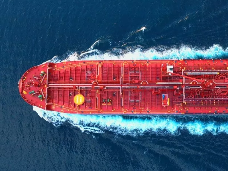 Overhead shot of cargo ship in water