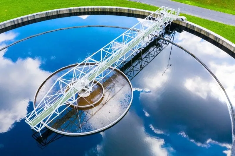 From research to practice: physically informed AI for wastewater networks